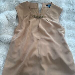 Beige sleeveless blouse with beading